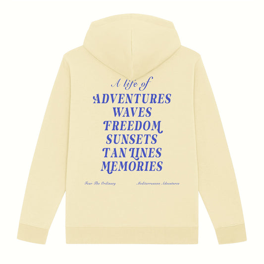Fear the ordinary cream premium organic cotton hoodie with blue adventure inspired back print.